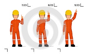An industrial worker is explaining something over his head