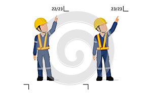 An industrial worker is explaining something over his head