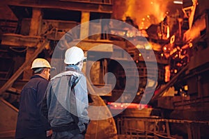 Industrial Worker at the factory welding closeup,