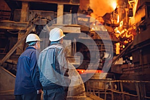 Industrial Worker at the factory welding closeup,