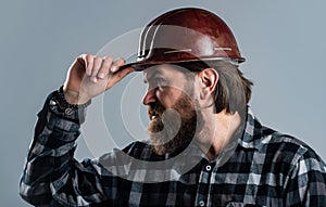 Industrial worker in helmet. man with hardhat. construction worker in hard hat. engineer architect working in safety