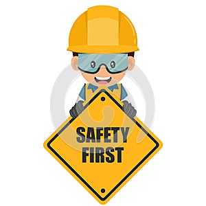 Industrial worker holding safety first sign. Engineer with his personal protective equipment. Industrial safety and occupational