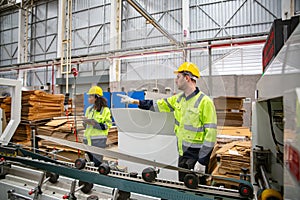 Industrial worker indoors in factory.