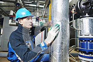 Industrial worker at insulation work
