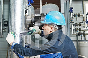 Industrial worker at insulation work