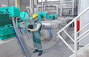 Industrial worker with notebook