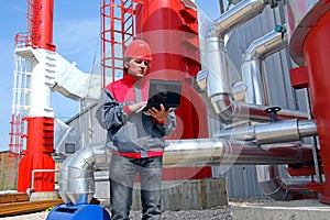 Industrial worker with notebook