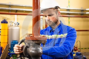 Industrial worker in safety helmet