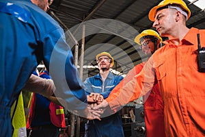 The industrial worker team in a large industrial factory with many equipment