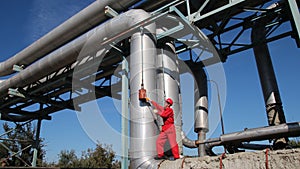 Industrial Worker Using Hand Tool in a Factory.