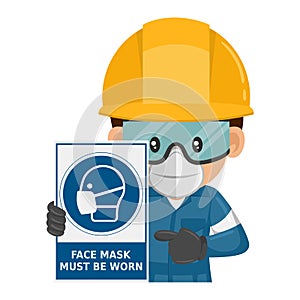 Industrial worker with a warning sign for the mandatory use of a face mask. Face mask must be worn. Industrial safety and photo