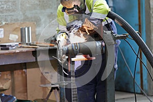 industrial worker welding in factory