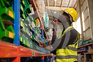 Industrial worker working at warehose factory