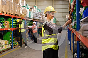 Industrial worker working at warehose factory