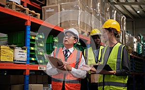 Industrial worker working at warehose factory