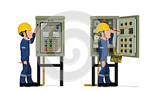 Industrial workers use screwdriver tester to measuring electric current in the electrical control cabinet