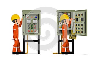 Industrial workers use screwdriver tester to measuring electric current in the electrical control cabinet