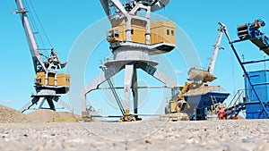 Industrial yard with quarrying and loading vehicles. Mining Excavation equiipment.