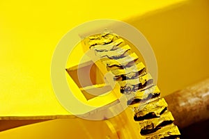 Industrial yellow gear with grease