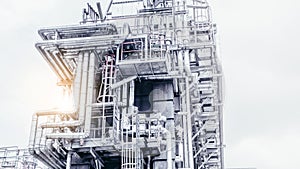 Industrial zone,The equipment of oil refining,Close-up of industrial pipelines of an oil-refinery plant,Detail of oil pipeline wit