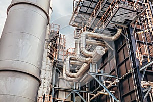 Industrial zone,The equipment of oil refining,Close-up of industrial pipelines of an oil-refinery plant,Detail of oil pipeline wit