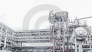 Industrial zone,The equipment of oil refining,Close-up of industrial pipelines of an oil-refinery plant,Detail of oil pipeline wit