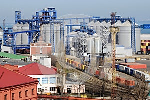 Industrial zone of Odessa sea cargo port with grain dryers photo