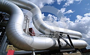 Industrial zone, Steel pipelines on blue sky