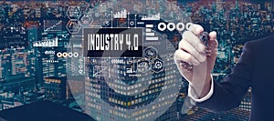 Industry 4.0 theme with businessman in city at night