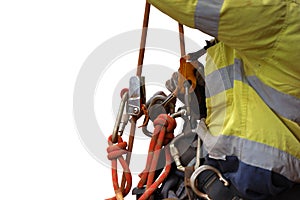 Industry abseiler worker working at height abseiling removing rope from chest harness croll safety device photo