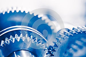 Industry background with blue gear wheels