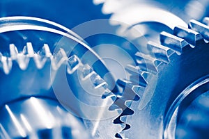 Industry background with blue gear wheels