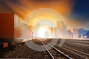 industry container trainst running on railways track against beautiful sun set sky use for land transport and logistic business