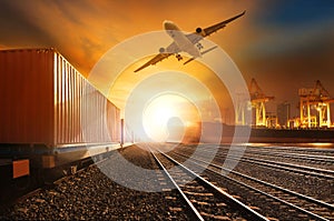 industry container trainst running on railways track and commercial ship in port ,plane air cargo flying above use for land