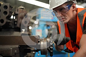 Industry engineer worker operate control heavy machine in factory.