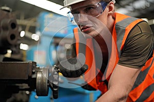 Industry engineer worker operate control heavy machine in factory.