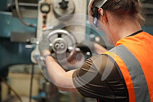 Industry engineer worker operate control heavy machine in factory.