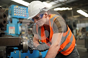 Industry engineer worker operate control heavy machine in factory.