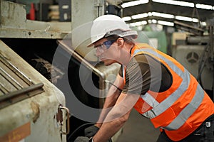 Industry engineer worker operate control heavy machine in factory.