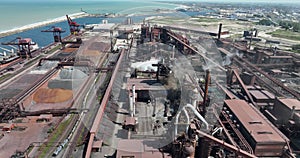 Industry metallurgical plant chimney smoke aerial.