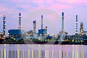 Industry Oil Refinery working in sunrise sky,