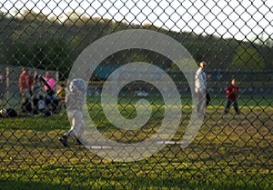 Industry standard galvanized chain link fence at a ball game