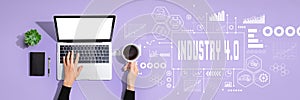 Industry 4.0 theme with person using laptop computer photo