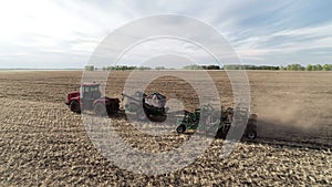 Industry work on rural land at farm field, farming agriculture machine, tractor