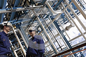 Industry workers and pipelines construction