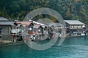 Ine Boathouse is traditional Fisherman Village on a rainy day of Kyoto.