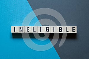 Ineligible - word concept on cubes