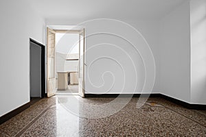 Empty room with brown tile