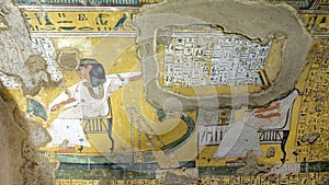 Inerkhau seated in a chair on a boat in the first chamber of TT359, the Tomb of Inerkhau in Deir el-Medina.