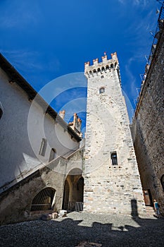 Ineror court of medieval castle Scaliger in old town Sirmione on lake Lago di Garda, Northern Italy